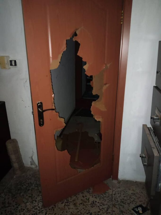 A damaged door at the Orlu Catholic Diocese