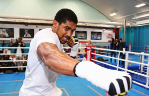 Anthony Joshua trains with Holyfield, Tyson’s former coach in U.S.