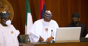 Buhari signs N17.127trn 2022 Budget into law Four bills, Buhari