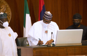 Buhari signs N17.127trn 2022 Budget into law Four bills, Buhari