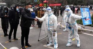 Chinese cities, factories lock down as COVID-19 spreads China, Chinese cities