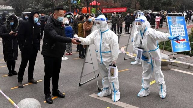 Chinese cities, factories lock down as COVID-19 spreads China, Chinese cities