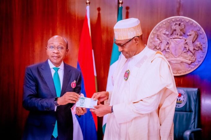 Buhari and CBN Governor unveiling Redesigned naira notes Naira redesign policy, Naira