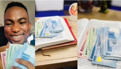 Pastor with new naira notes in bible New naira notes in bible