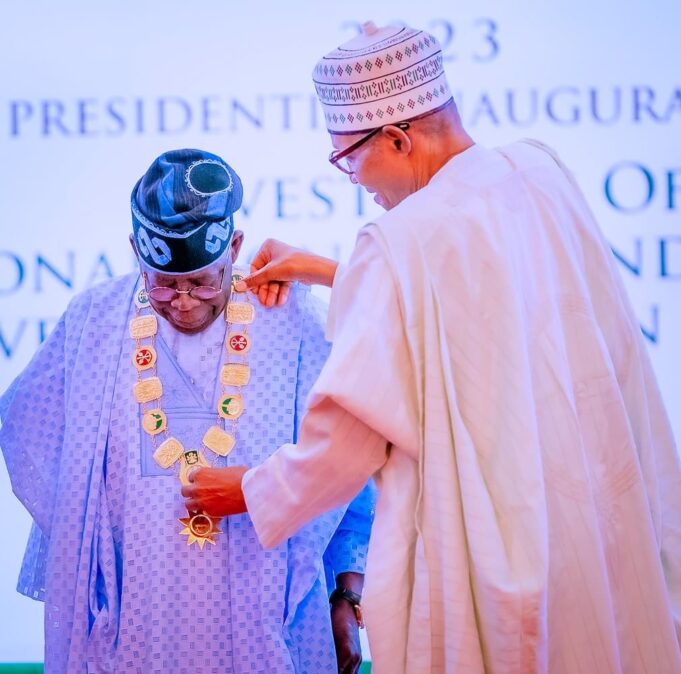 Buhari conferring national honour on Tinubu Tinubu national honour