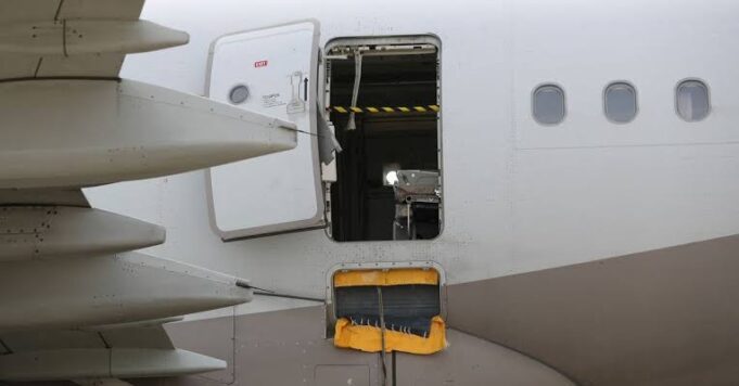 Plane door opened mid-air Plane door