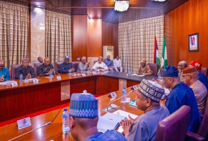 Tinubu with economic advisory committee members Dangote