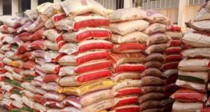 Rice may fall further after price peg at N57,000 — Farmers association Workers, Bag of rice