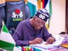 Tinubu signs Electoral Bill into law Grant, Tinubu