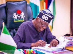 Tinubu signs Electoral Bill into law Grant, Tinubu