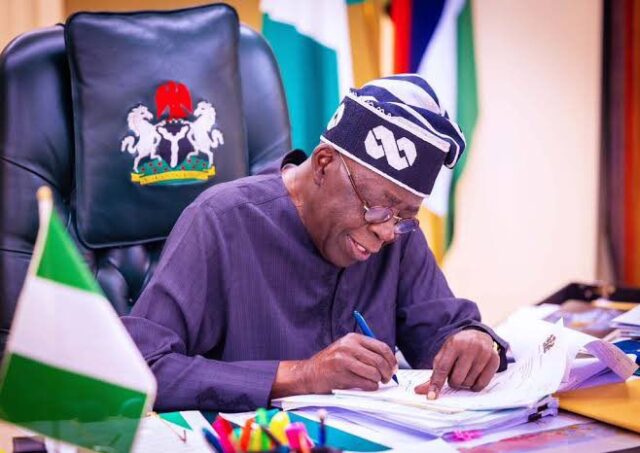 Tinubu signs Electoral Bill into law Grant, Tinubu