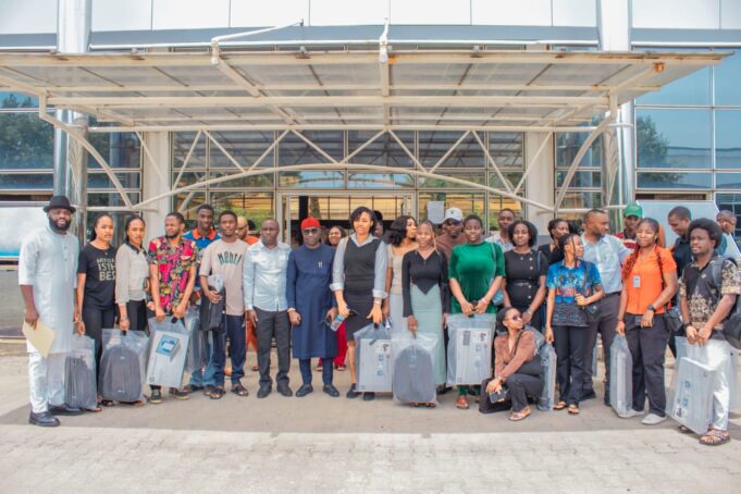 Officials of the Presidential Amnesty Programme (PAP) in group photograph with PAP final year and post-graduate scholarship students at Baze University