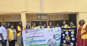 Abuja mega Lions Club, NES mark world environment day with tree planting