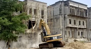 FCTA demolishes buildings under high-tension lines