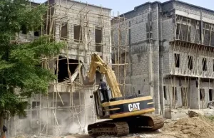 FCTA demolishes buildings under high-tension lines