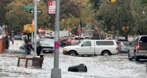 Heavy rains kill 2, disrupt flights in New York New York