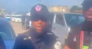 Police launch investigation after officers spotted in cult insignia
