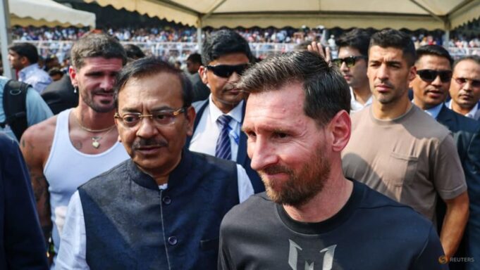 Fans throw objects, invade pitch as Messi visits India Fans