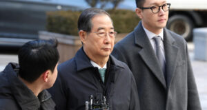 Ex-South Korean PM Han jailed for 23 years Han