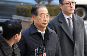 Ex-South Korean PM Han jailed for 23 years Han