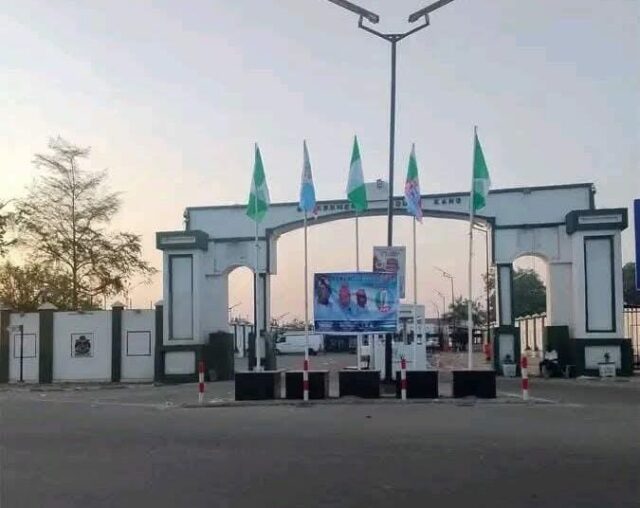 APC flags raised at Kano govt house ahead of Gov Yusuf’s return