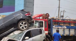 Family narrowly escapes death as tomato truck crashes on Otedola Bridge