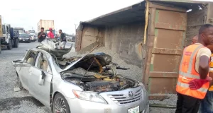 Man killed, wife injured as truck crushes car in Lagos