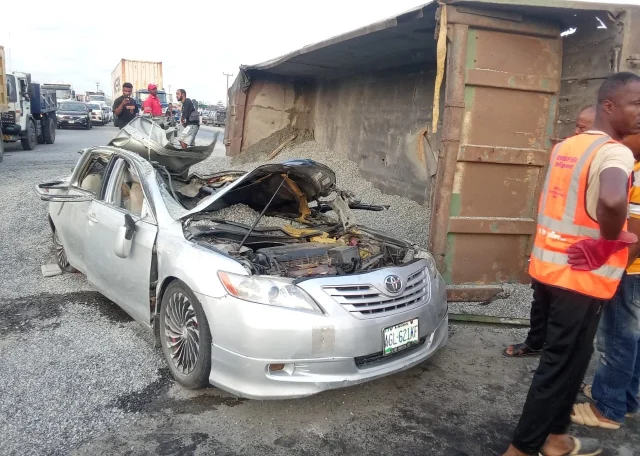 Man killed, wife injured as truck crushes car in Lagos