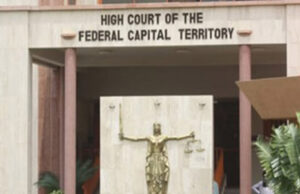Justice Crack remains in custody as lawyers disagree over defence leadership
