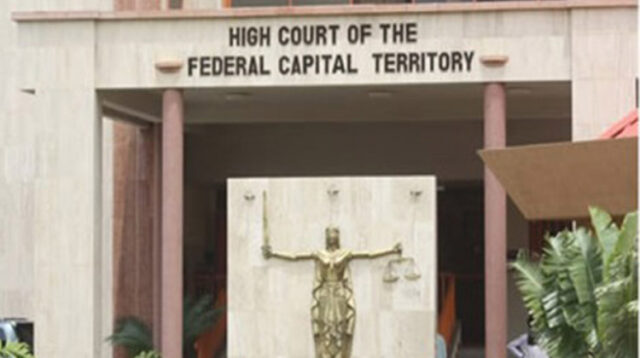 Justice Crack remains in custody as lawyers disagree over defence leadership