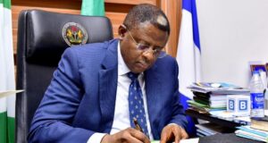 Otu signs four reform bills into law