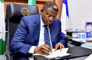 Otu signs four reform bills into law