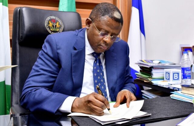 Otu signs four reform bills into law