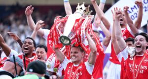 Arsenal lift Premier League trophy as Tottenham survive relegation Arsenal