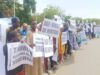 Tension in Abuja as protesters oppose plan to delist opposition parties
