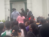 UK-based Nigerians protest delays at NIS Manchester passport centre
